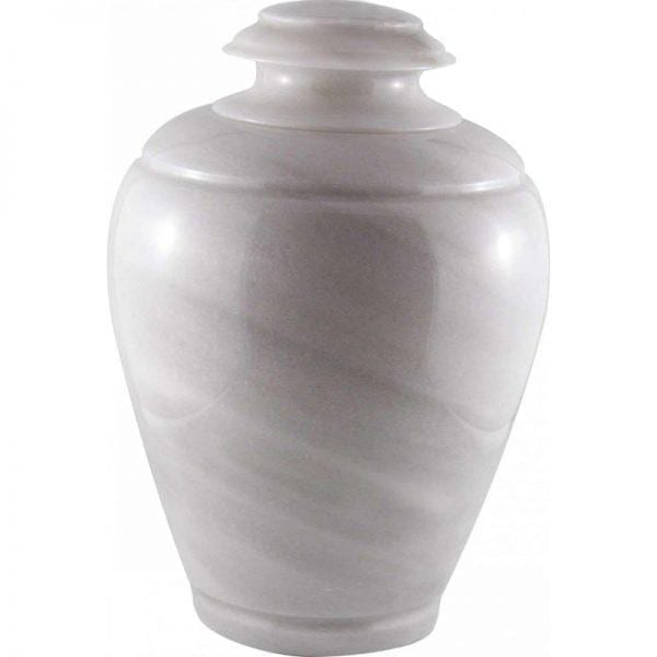 urne funéraire en marbre blanc sous forme de vase pour hommage et recueillement des cendres du défunt